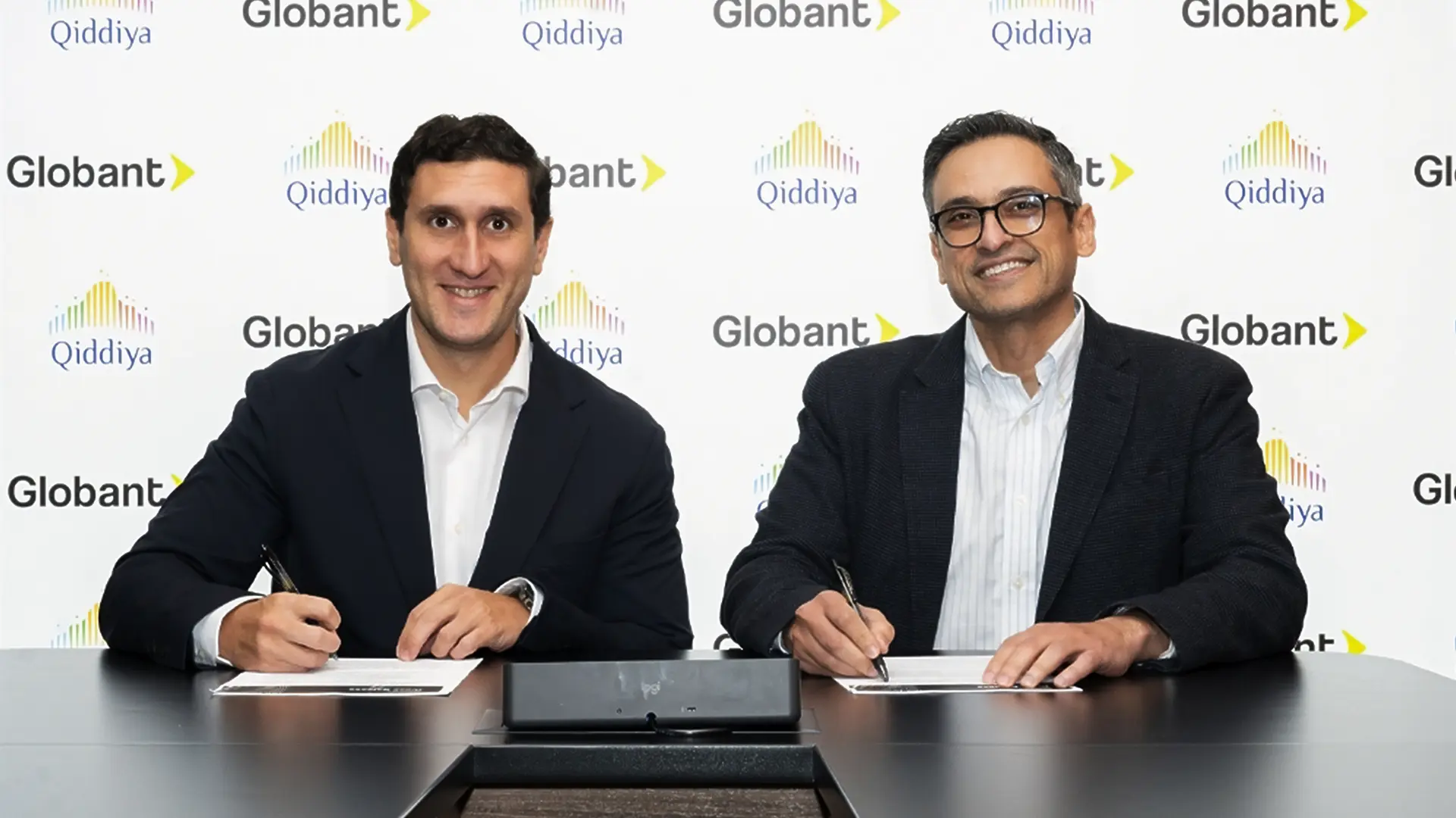 Representatives from Globant and Qiddiya sign partnership