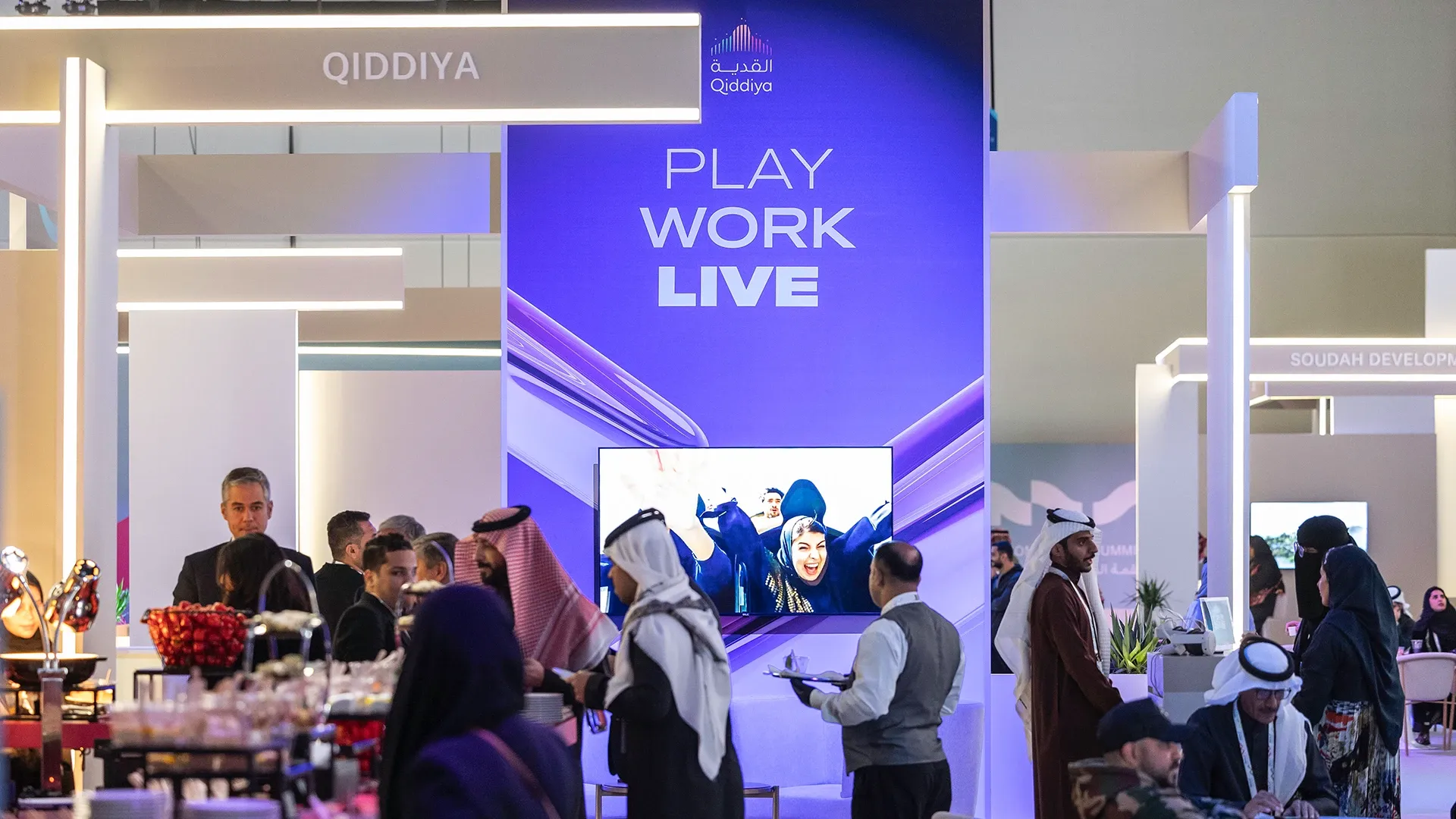 Visitors at the Qiddiya Investment Company stand at IMS 2024